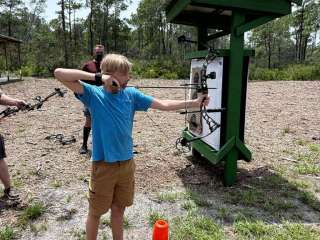 Kid holding bow