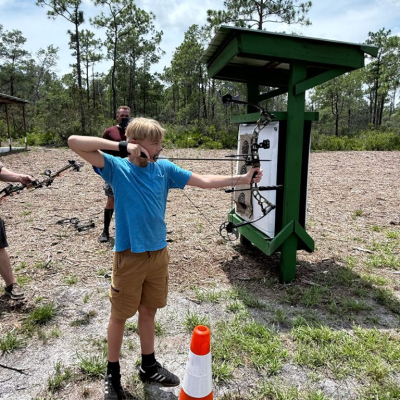 Kid holding bow